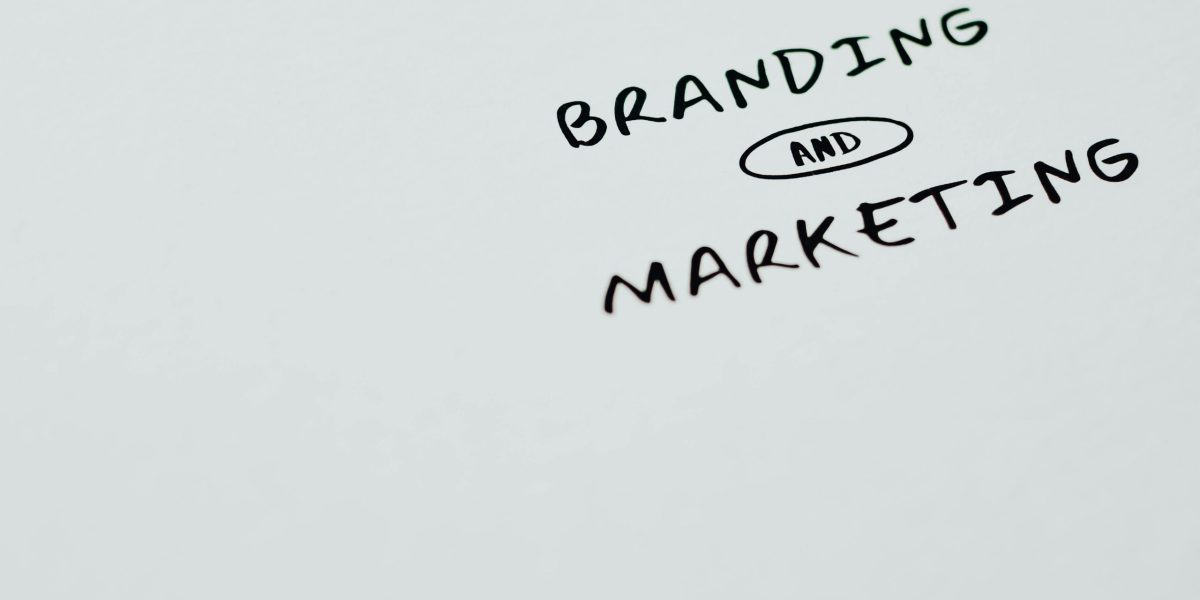 A minimalist image featuring the words 'Branding' and 'Marketing' on a white background, ideal for digital marketing themes.